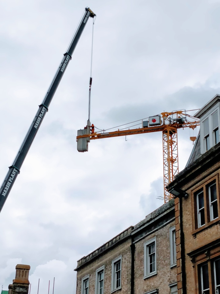 Loading counterweights to a crane, Winchester peterbjordan Blipfoto