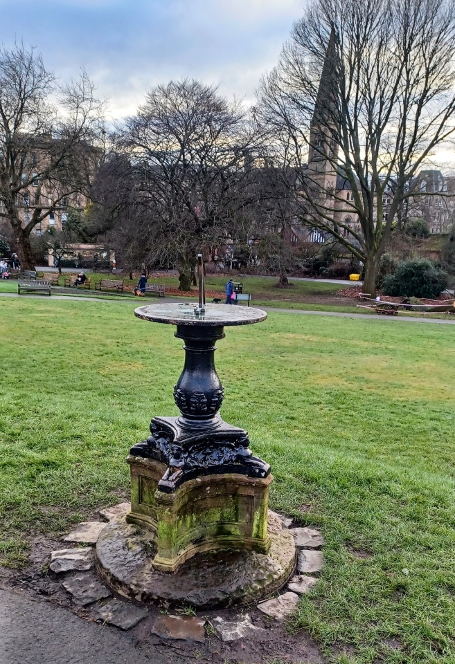 Sundial in Botanic Gardens Oran Mor behind william7253 Blipfoto